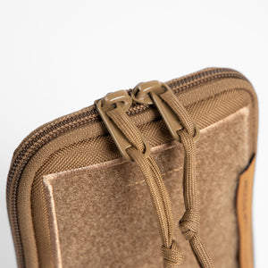 Detailed shot of top of Tactical Dump Pouch showing zipper closure. 