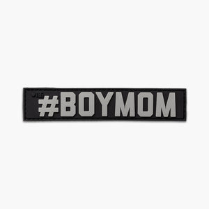 Black nametape with gray lettering reading #BOYMOM