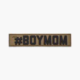 Brown nametape with black lettering reading #BOYMOM