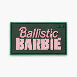 Green patch with pink lettering reading Ballistic Barbie. The letter I in barbie is a bullet.