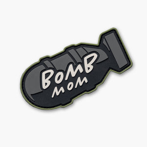 Gray bomb shaped patch with white text reading Bomb Mom