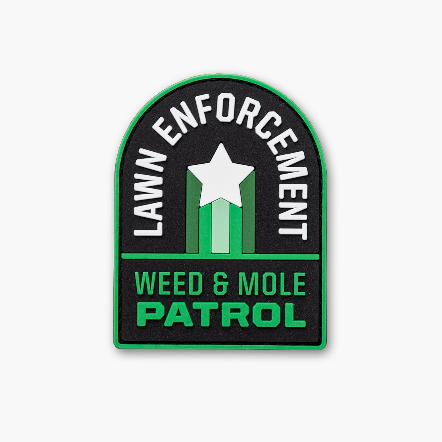 Vertical patch with text reading Lawn Enforcement curved above lower text reading Weed & Mole Patrol