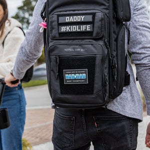 Rad Dad patch on black backpack