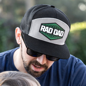 Man wearing Rad Dad hat. 