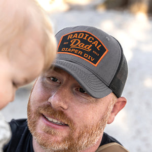 Man wearing Radical Dad Diaper Division hat