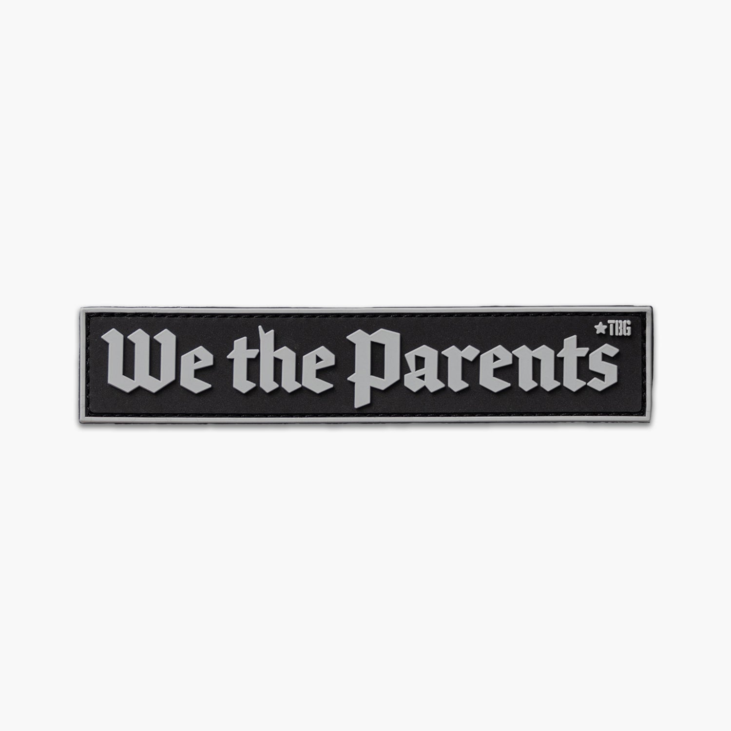 Black patch with gray lettering reading We the Parents in constitutional style script. 