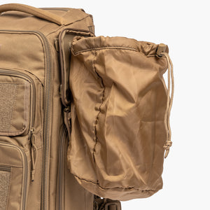 Opened Coyote Brown dump pouch shown affixed to MOD diaper bag side webbing.