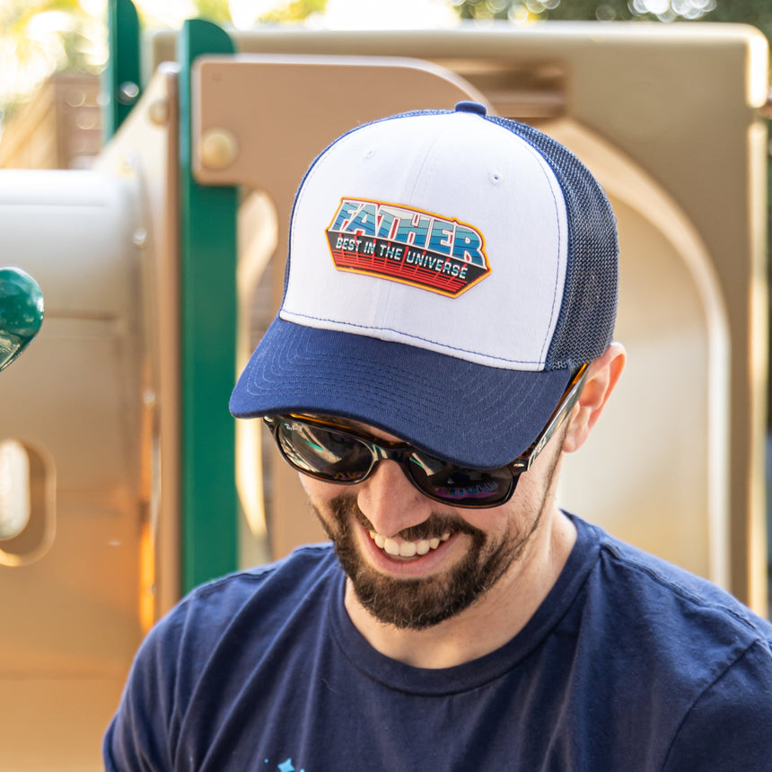 Man wearing Best Father in the Universe Hat