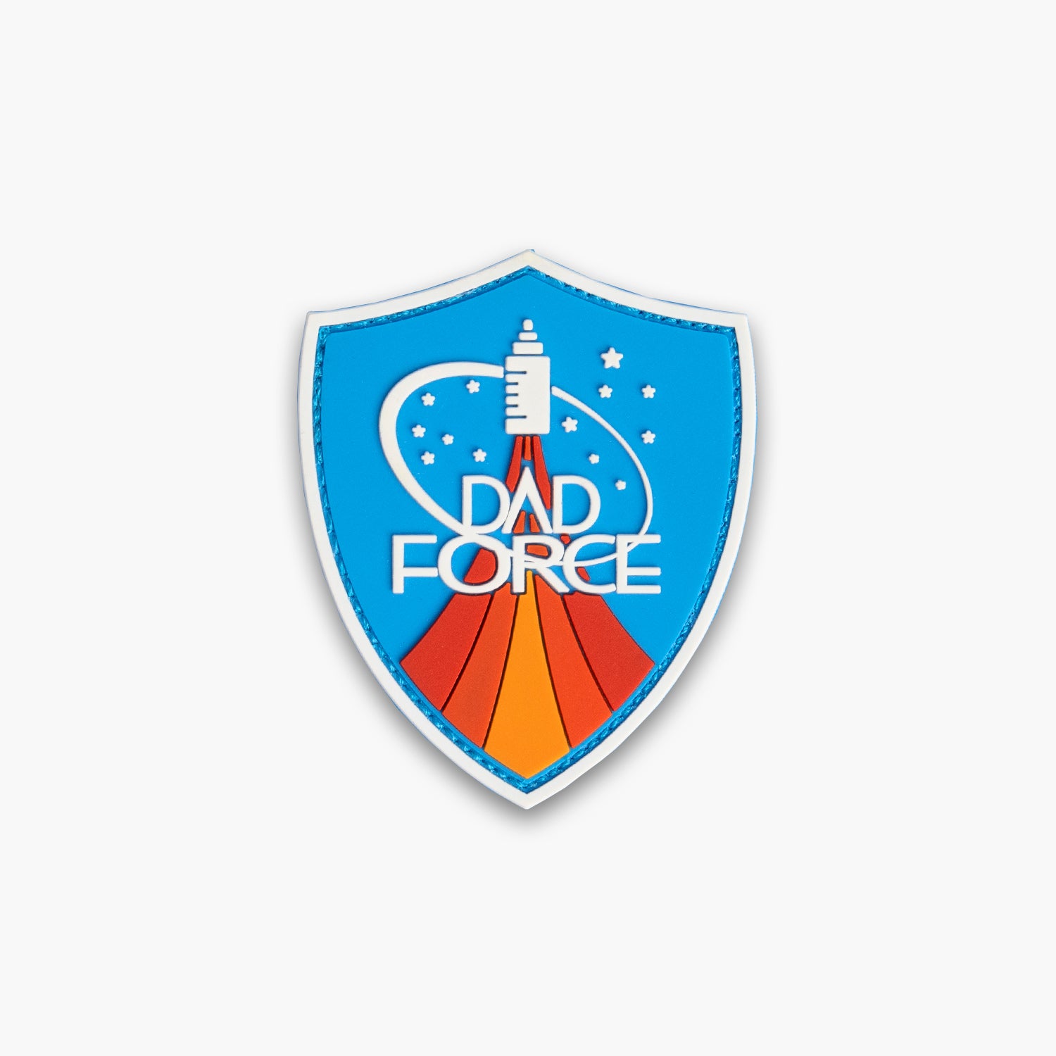 Shield style patch with rocket launching against blue sky above stylized flames. Reads Dad Force.