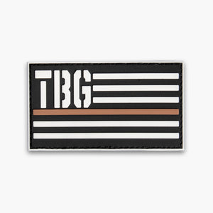 TBG flag with white TBG letters and white bars. Single brown bar across middle. Black background.