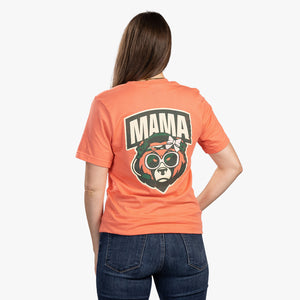 Rear view of woman wearing coral t-shirt with bear face and mama written above it. 